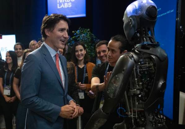 September 28, 2023, Montreal, PQ, Canada: Prime Minister Justin Trudeau speaks to an AI robot at the All In artificial intelligence conference Thursday, September 28, 2023 in Montreal. Montreal Canada  - ZUMAc35_ 20230928_zaf_c35_080 Copyright: xRyanxRemiorzx