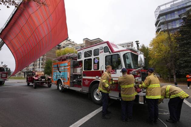 September 30, 2023, Calgary, AB, CANADA: Calgary firefighters hoist a banner with the names of children that died at residential schools during the Truth and Reconciliation Day ceremonies in Calgary on Saturday, September 30, 2023. Calgary CANADA  - ZUMAc35_ 20230930_zaf_c35_024 Copyright: xToddxKorolx