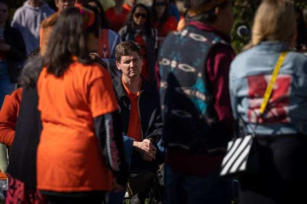 September 30, 2023, VANCOUVER, BC, CANADA: B.C. Premier David Eby sits at the Reconciliation Pole at the University of British Columbia to listen to residential school survivors stories during National Day for Truth and Reconciliation in Vancouver, B.C., Saturday, Sept. 30, 2023. VANCOUVER CANADA  - ZUMAc35_ 20230930_zaf_c35_151 Copyright: xEthanxCairnsx