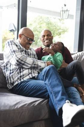 Happy african american father, son and grandfather sitting on couch,laughing and embracing Happy african american father, son and grandfather sitting on couch,laughing and embracing. Childhood, home, family, togetherness, domestic life and lifestyle, unaltered., model released, , property released, Cape Town, South Africa, 07.09.2023, 4187619.jpg, people,happy,african american,father,son,grandfather,sitting,couch,laughing,embracing,childhood,home,family,togetherness,domestic life,life lifestyle,unaltered,kid,parent,mother,together,daughter,little,happiness,young,dad,cheerful,fun,smiling,smile,lifestyle,cute,joy,sofa,love,mom,african,american,domestic,life Senior,Elderly,Man,Male,Multiracial,Child,Boy,Black,Mature Adult