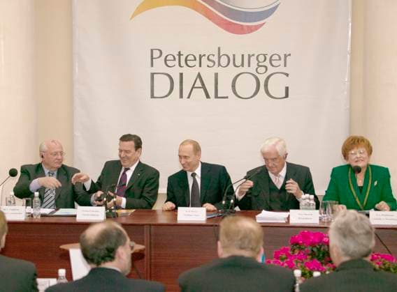 St Petersburg, Russia. Chairman of the Russian Coordinating Committee of the Forum, former Soviet President Mikhail Gorbachev, German Chancellor Gerhard Schroeder, Russian President Vladimir Putin, Chairman of the German Coordinating Committee of the Forum, member of the supervisory board of the Axel Springer publishing house Peter Benisch and Rector of St Petersburg State University Lyudmila Verbitskaya (L-R) gather at the plenary session of the 3rd Russian-German Public Forum Petersburg Dialogue in the auditorium of St Petersburg State University. Alexei Dityakin TASS  62743624