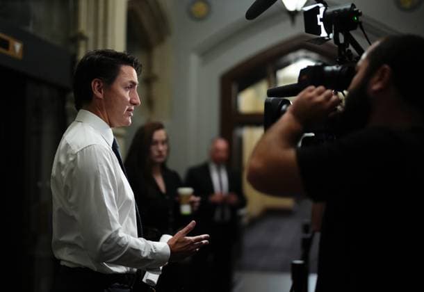 October 3, 2023, Ottawa, ON, CANADA: Prime Minister Justin Trudeau speaks to reporters as he arrives for a cabinet meeting in Ottawa, Tuesday, Oct. 3, 2023. Liberal members of Parliament are meeting to discuss the historic vote expected to select a new House of Commons Speaker. Ottawa CANADA  - ZUMAc35_ 20231003_zaf_c35_008 Copyright: xSeanxKilpatrickx