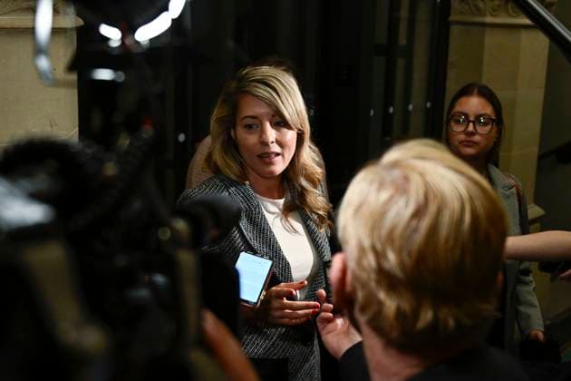 October 3, 2023, Ottawa, ON, CAN: Minister of Foreign Affairs Melanie Joly speaks to reporters as she arrives for a meeting of the federal cabinet on Parliament Hill in Ottawa, on Tuesday, Oct. 3, 2023. Ottawa CAN  - ZUMAc35_ 20231003_zaf_c35_067 Copyright: xJustinxTangx