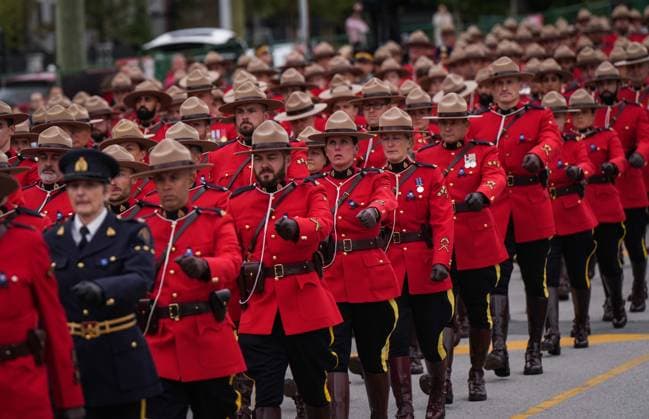 October 4, 2023, LANGLEY, BC, CANADA: RCMP officers march behind a hearse carrying RCMP Const. Rick O Brien s casket to a regimental funeral in Langley, B.C., on Wednesday, October 4, 2023. O Brien, 51, was killed last month while executing a search warrant at a home in Coquitlam. LANGLEY CANADA - ZUMAc35_ 20231004_zaf_c35_090 Copyright: xDarrylxDyckx
