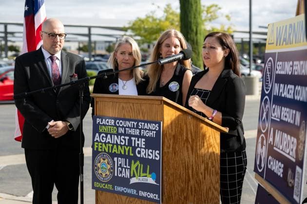 October 10, 2023, Roseville, CA, USA: Jake Wolf listens to Regina Leah Chavez speak about their daughter Jewel Marie wolf during a press conference after the sentencing of Nathaniel Evan Cabacungan, 22, for second-degree murder for the fentanyl death of her daughter at Placer Superior Court Tuesday, Oct. 10, 2023 in Roseville. Nathaniel Evan Cabacungan, 22, was sentenced to 15 years to life in prison. Cabacungan is believed to be the first person in California to be convicted of murder for a fentanyl death. Roseville USA - ZUMAj89_ 20231010_zaf_j89_003 Copyright: xPaulxKitagakixJr.x