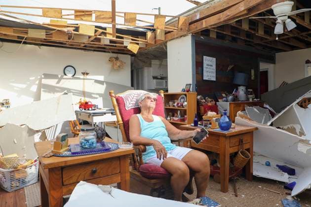 Bilder des Jahres 2023, News 10 Oktober News Themen der Woche KW41 News Bilder des Tages October 12, 2023, Dunedin, Florida, USA: Sondra Martin, 73, sits in her easy chair in what remains of her living room on Thursday, Oct 12, 2023, at her mobile home, Unit 52, at the Honeymoon Mobile Home Park in Dunedin after suspected tornadoes sliced through portions of the Tampa Bay area early Thursday morning, damaging homes and businesses across the region. Dunedin USA - ZUMAs70_ 20231012_zan_s70_021 Copyright: xDouglasxR.xCliffordx