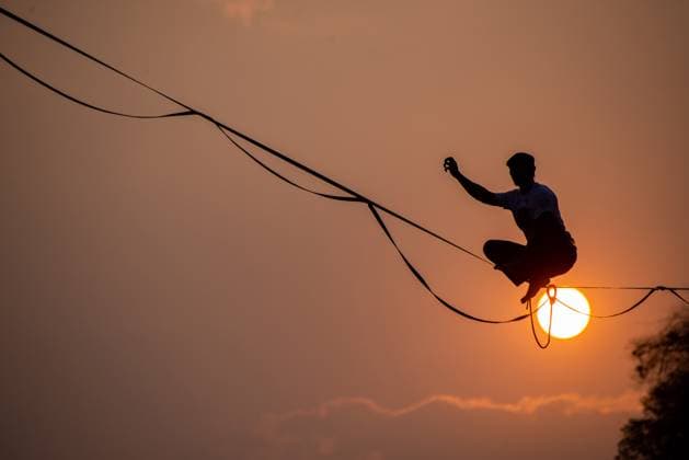 News Themen der Woche KW41 HIGHLINE FESTIVAL IN BANDUNG Participants walk on a tightrope during the Highline Festival in Bandung, West Java, Indonesia October 14, 2023. The festival was held to build awareness to protect the environment, especially the karst hills in this area, which was attended by at least 7 countries such as Hungary, Belarus, the Netherlands, Austria, Singapore, Malaysia and India. IMAGO KHAIRIZAL MARIS Bandung West Java Indonesia Copyright: xKharizalxMarisxKhairizalxMarisx HIGHLINE FESTIVAL IN BANDUNG20