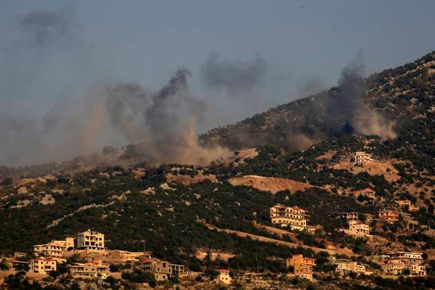 News Themen der Woche KW41 (231015) -- BEIRUT, Oct. 15, 2023 -- This photo taken in the Lebanese town of Al-Marion shows smoke billowing following an Israeli missile bombardment on the town of Shebaa in southeast Lebanon, Oct. 14, 2023. A fighter with Hezbollah, a Lebanese military group, was killed in the Israeli attacks that targeted the Shebaa Farms on Saturday afternoon, a statement by the Shiite group reported. Moreover, a Lebanese man and his wife were killed after several Israeli artillery shells targeted their house on the outskirts of the town of Shebaa in southeast Lebanon, as fire exchange intensified between Hezbollah and Israeli forces on the Shebaa-Kfarchouba axis, Lebanese military sources told Xinhua. (Photo by Xinhua) LEBANON-ISRAEL-BORDER TENSI 