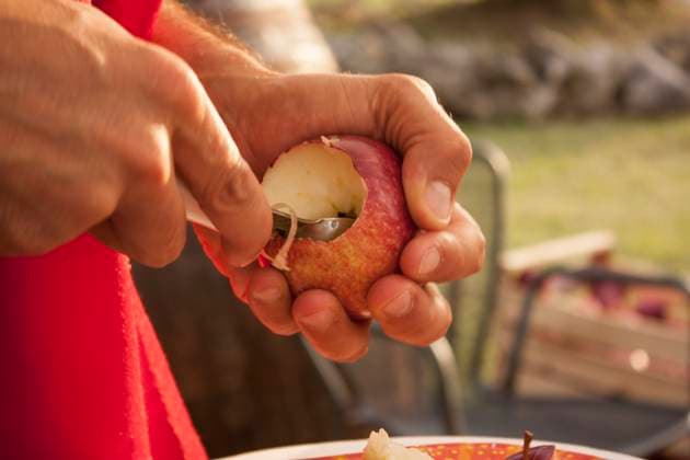 Preparing a Recipe with fresh red apples, evocative image Recipe with apples Copyright: xFilippoxCarlotx COMM (6928)