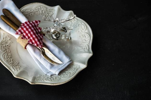 Table setting for Christmas dinner with festive decoration on dark wooden table with copyspace , 38612918.jpg, berry, blackboard, branch, card, chalkboard, christmas, copyspace, cutlery, dark, decor, decoration, dining, dinner, dinnerware, dishware, eating, festtive, flatware, food, fork, holiday, knife, napkin, ornament, restaurant, rustic, serving, set, setting, silverware, snowflake, table, tablecloth, tableware, vintage, winter, xmas RECORD DATE NOT STATED