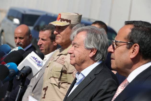 (231020) -- RAFAH, Oct. 20, 2023 -- UN Secretary-General Antonio Guterres (2nd R) speaks while visiting the Egyptian side of the Rafah border crossing with Gaza, on Oct. 20, 2023. Guterres on Friday visited the Egyptian side of the Rafah border crossing with Gaza, ahead of the anticipated opening of the crossing to bring needed aid into the besieged Palestinian enclave. At the Rafah crossing, the only crossing point between Egypt and the Gaza Strip, Guterres said the large convoy loaded with food and medicine was the difference between life and death for the (Palestinian) people. ) EGYPT-RAFAH CROSSING-UN-GUTERRES AhmedxGomaa 