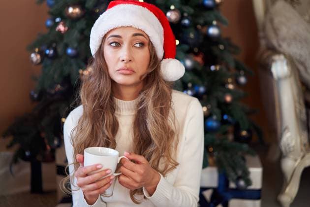 Christmas Woman dressed white sweater Santa hat sitting floor near christmas tree Caucasian female relaxing winter holiday home interior drink hot morning coffee and upset. It was a bad year Boring, model released, , 40071324.jpg, christmas, woman, cozy, santa hat, tea, sitting, floor, hot, upset, coffee, It was a bad year, serious, drink, person, indoors, quarantine, holding, holiday, relaxation, room, living room, young adult, eve, one person, female, xmas, white, christmas tree, merry, caucasian, festive, interior, relax, celebrate, comfort, celebration, cheerful, cute, decoration, attractive, new year, sweater, beverage, cup, morning, sad, Boring, stay home, alone, lonely RECORD DATE NOT STATED