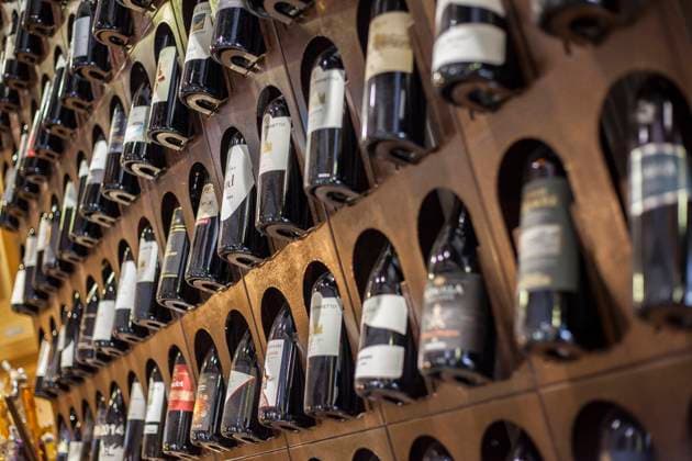 Wine store in a restaurant with lots of bottles on display Wine Store Copyright: xFilippoxCarlotxPhotographyx EDITT (2410)