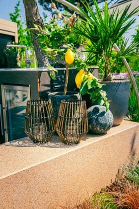 Outdoor kitchen in a garden or terrace with plants and decoration and lantern Outdoor kitchen in a garden or terrace with plants and decoration and lantern Copyright: xZoonar.com IngridxBalabanovax 20529940