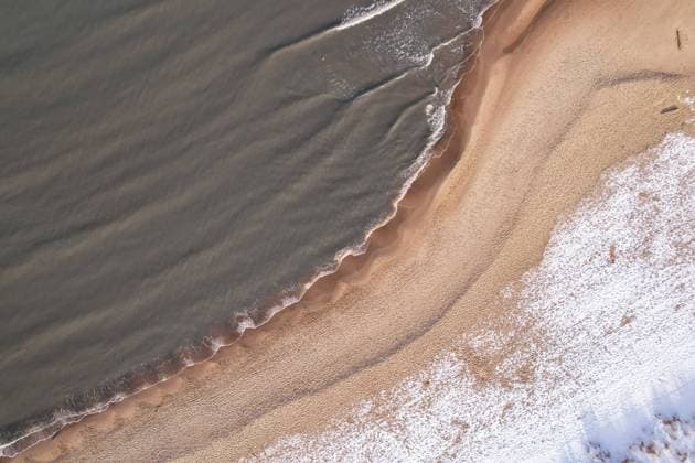 Creative Highlights World Winter in cold Baltic sea snowy beach in Gdansk. Aerial view of snow covered beach and dunes and dark calm sea nature landscape captured with drone. Tourism in Poland Winter in cold Baltic sea snowy beach in Gdansk. Aerial view of snow covered beach and dunes and dark calm sea nature landscape captured with drone. Winter tourism in Poland Copyright: xZoonar.com AnastasiiaxYanishevskax 20561735