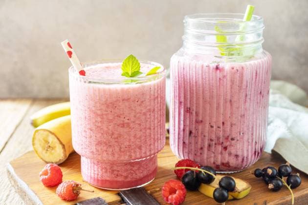 Set of fresh various delicious milkshakes or smoothies with fresh berries on a rustic background. Raspberries and black currant. Set of fresh various delicious milkshakes or smoothies with fresh berries on a rustic background. Raspberries and black currant. Copyright: xZoonar.com ELENAxHRAMOVAx 20598097