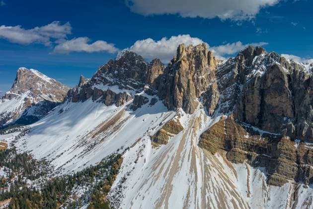 Creative Highlights World Rocky snow mountains at sunset aerial Aerial view of amazing rocky mountains in snow at sunset, Dolomites, Italy Copyright: xZoonar.com Kokhanchikovx 20604520