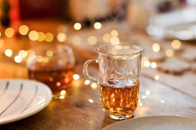 Glass cup of tea on table at home, ONAF00609