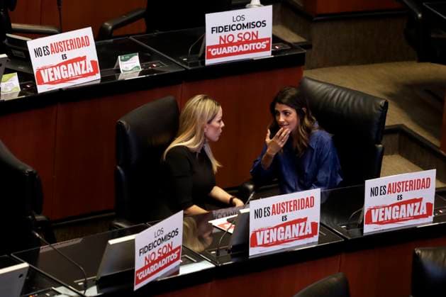 October 24, 2023, Mexico City, Mexico: Senators Veronica Martinez and Silvana Beltrones surrounded by banners rejecting the extinction of the trusts of the Judicial Branch of the Federation during the session in the Senate in Mexico City. on October 24, 2023 in Mexico City, Mexico Mexico City Mexico - ZUMAe321 20231024_zia_e321_038 Copyright: xLuisxBarronx