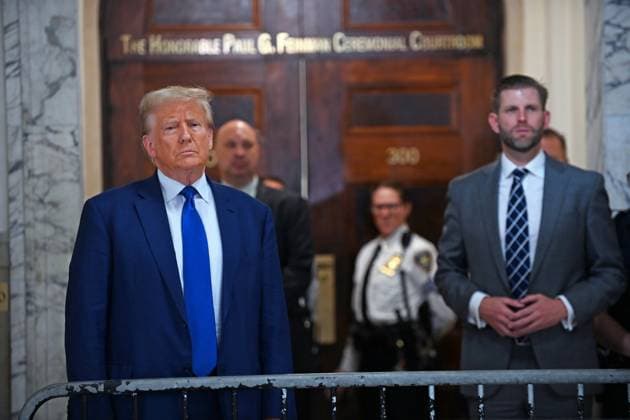 October 25, 2023, New York, New York, USA: Donald Trump is back in court for the second day of testimony with Michael Cohen on the stand for the NYS civil fraud case against the former president. Cohen is under cross examination by Trump lawyer, Alina Habba (in blue jacket). Mr. Trump was fined $10,000 by the judge today following an incident when He broke his Ã¢â‚¬oegagÃ¢â‚¬Â order. Trump is seen here with his son Eric Trump. (PHOTO: Andrea RENAULT Zuma Press) New York USA - ZUMAg115 20231025_faf_g115_048 Copyright: xAndreaxRenaultx