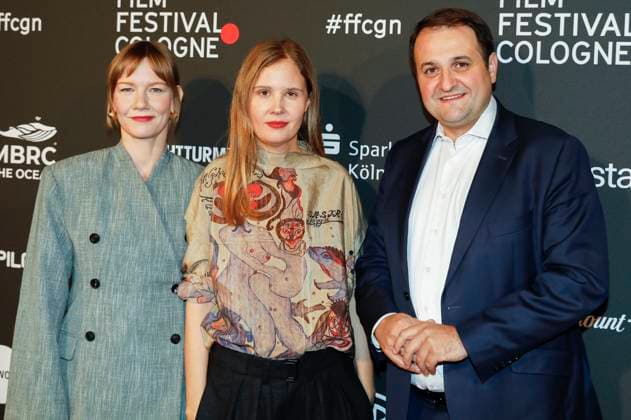 Sandra Hüller, Justine Triet und Nathanael Liminski bei der Verleihung der Cologne Awards auf dem 33. Film Festival Cologne 2023 im E-Werk. Köln, 26.10.2023
