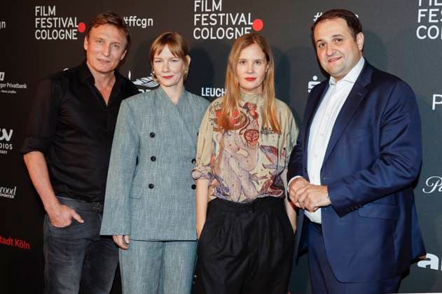 Oliver Masucci, Sandra Hüller, Justine Triet und Nathanael Liminski bei der Verleihung der Cologne Awards auf dem 33. Film Festival Cologne 2023 im E-Werk. Köln, 26.10.2023