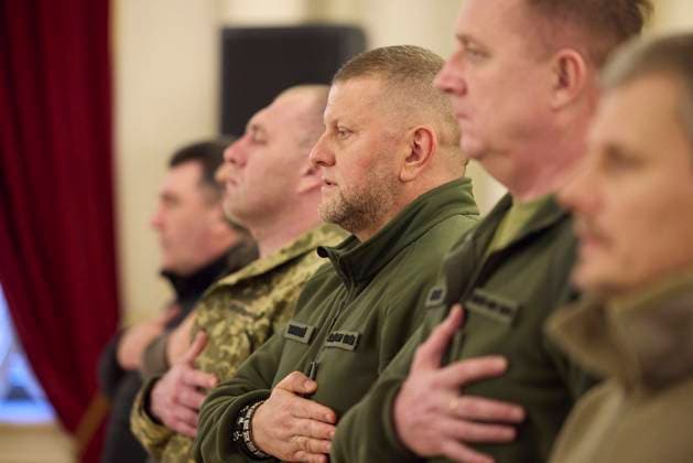 October 27, 2023, Kyiv, Kiev Oblast, Ukraine: The Commander-in-Chief of Ukraine Armed Forces ValeriyÃ‚ Zaluzhny, center, stands for the national anthem during a Golden Star Order ceremony for hero families at the Mariinsky Palace, October 27, 2023 in Kyiv, Ukraine. Kyiv Ukraine - ZUMAp138 20231027_zaa_p138_012 Copyright: xUkrainexPresidency UkrainianxPrex