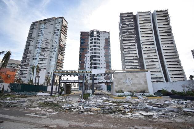 (231028) -- GUERRERO, Oct. 28, 2023 -- This photo taken on Oct. 26, 2023 shows damaged buildings after being attacked by Hurricane Otis in Acapulco, state of Guerrero, Mexico. Hurricane Otis left at least 27 people dead and four missing as it hit the coast of the southern Mexican state of Guerrero Wednesday morning as a Category 5 hurricane, an official said Thursday. (Photo by Xinhua) MEXICO-GUERRERO-HURRICANE OTIS DassaevxTellezxAdame 