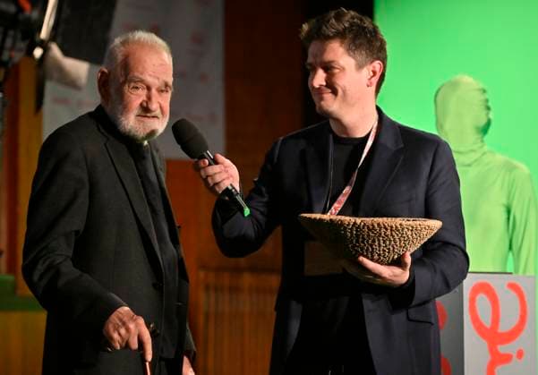 Closing ceremony of the 27th International Documentary Film Festival Ji.hlava, was held in Jihlava, Czech Republic, on October 23, 2023. The award for contribution to world cinema was presented to Hungarian director Bela Tarr (left) by festival president Marek Hovorka (right). (CTKxPhoto LubosxPavlicek) CTKPhotoP2023102806363  CTKPhotoP2023102806363