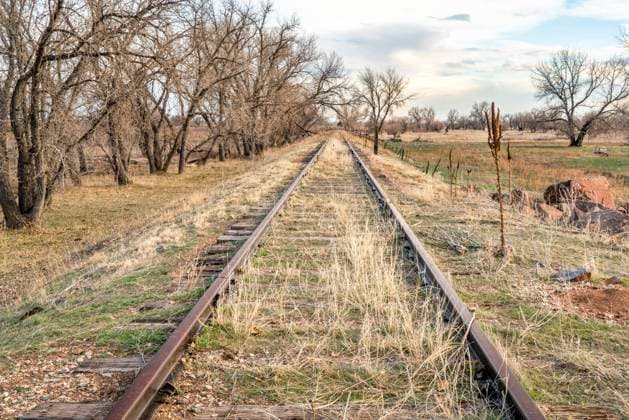 abandoned railroad tracks in Colorado prairie abandoned railroad tracks in a prairie of eastern Colorado Copyright: xZoonar.com MarekxUliaszx 13661501