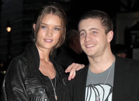 Rosie Huntington Whiteley and Tyrone Wood at the Shine A Light film premiere at Odeon cinema 20957, LONDON, UNITED KINGDOM, Wednesday, April 4, 2008, UK, IRELAND, DUBAI, USA AND CANADIAN USE ONLY: Rosie Huntington Whiteley and Tyrone Wood at the Shine A Light film premiere at Odeon cinema. Shine a Light is a career-spanning documentary on the Rolling Stones, with concert footage from their A Bigger Bang tour. Photograph: PacificCoastNews.com UK OFFICE: +44 131 225 3333 3322 US OFFICE: 1 310 261 9676, Credit:PacificCoastNews.com Avalon United Kingdom  Copyright: xPacificCoastNews.comx xAvalonx 0524060482