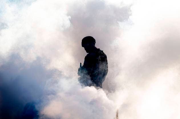October 16, 2023 - Fort Liberty, North Carolina, U.S. - Tech. Sgt. Paul Wyckoff, 18th Combat Weather Squadron staff weather officer, walks through a cloud of smoke during exercise Thunder Challenge 2023 at Fort Liberty, N.C., Oct. 16, 2023. Thunder Challenge is an annual exercise in which combat weather teams come together to compete in events that test their knowledge of CW operations. (photo: Staff Sgt. Spencer Slocum) Fort Liberty U.S. - ZUMAz03_ 20231016_shn_z03_241 Copyright: xU.S.xAirxForcex