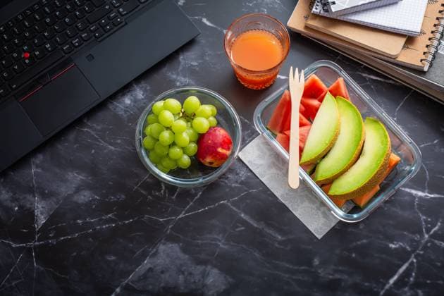 Healthy snack at office workplace Healthy snack at office workplace, organic vegan meals from take away lunch box Copyright: xZoonar.com IngridxBalabanovax 20626739