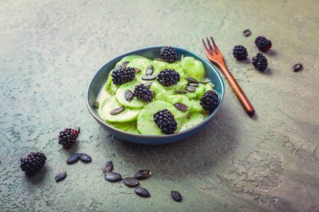Cucumber salad with blackberries and yogurt dressing and seeds Cucumber salad with blackberries and yogurt dressing and seeds Copyright: xZoonar.com IngridxBalabanovax 20647076