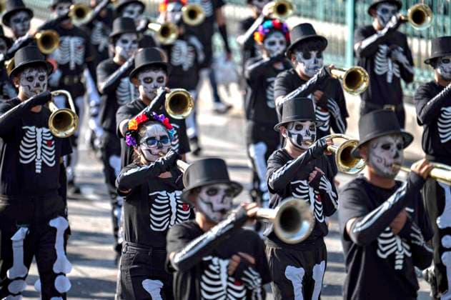 November 4, 2023, Mexico City, DF Mexico, Mexico: A skeleton brass band marches down Paseo de La Reforma in costumes and face paint during the Grand Procession, marking the final day of the Day of the Dead celebrations, November 4, 2023 in Mexico City, Mexico. Mexico City Mexico - ZUMAp138 20231104_zaa_p138_069 Copyright: xMinistryxOfxCulture MexicanxGovex
