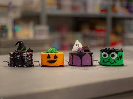 Four delicious funny decorated cakes on a table at a Halloween party 10234752 RECORD DATE NOT STATED