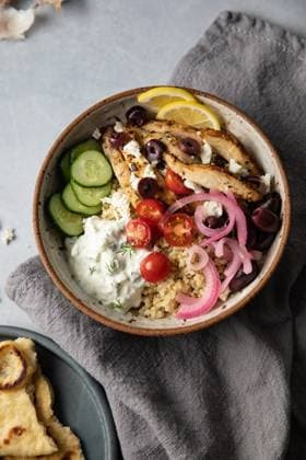 IMAGO Creative, Food, Pickled Onions Healthy lunch bowl with greek chicken, feta and tzatziki Sandpoint, Idaho, United States R_LYWPRM220325-940786-01