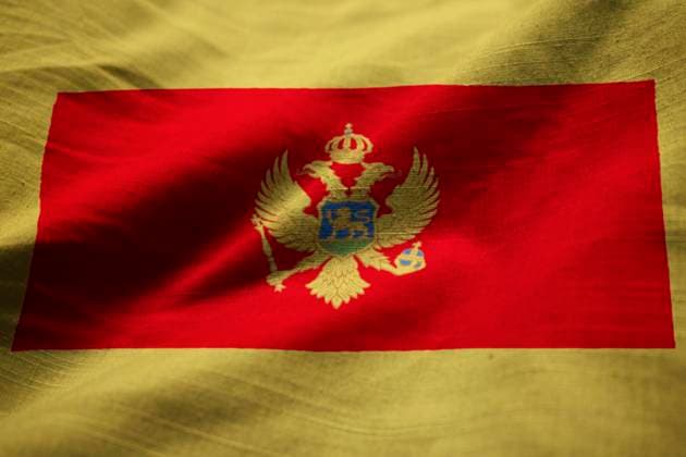 Closeup of Ruffled Montenegro Flag, Montenegro Flag Blowing in Wind , 27735152.jpg, abstract, background, celebration, closeup, country, culture, flag, history, patriotic, patriotism, patriot, independence, international, language, map, nation, national, pattern, texture, tourism, travel, world, fabric flag, flag banner, independence day, national day, national flag, national holiday, ruffled flag, shiny flag, waving flag, destination, colors, fabric, geography, Montenegro, montenegro flag, montenegro map, montenegro people, flag of montenegro, Podgorica, podgorica flag, gold, red, Balkans, Adriatic coastline, Europe, european, golden, square, RECORD DATE NOT STATED