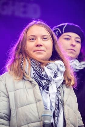 November 12, 2023, Amsterdam, Netherlands: Greta Thunberg seen on stage during the demonstration. An estimated 85,000 demonstrators took part in a peaceful climate march with no arrests. This surpassed the climate demonstration of two-years-ago which had 45,000 participants. The demonstrators walked a route from Dam Square to the Museumplein. On their route they joined a large pro-Palestinian march. Among the marchers was Swedish climate activist Greta Thunberg, she later gave a short speech on the Museumplein. The march was organized by nine organizations, under the name Climate Crisis Coalition, this including Extinction Rebellion, Greenpeace, Oxfam Novib, and the trade union FNV. Also demonstrating was a feminist block, a children™s bl - ZUMAs197 20231112_aab_s197_124 Copyright: xCharlesxMxVellax
