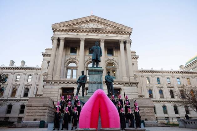 Pussy Riot films a music video to protest Indiana’s near total abortion ban in Indianapolis, USA - 14 Nov 2023 Russian activist group Pussy Riot films a music video for a song titled, God Save Abortion, to protest Indiana’s near total abortion ban, on the steps of the Indiana Statehouse in Indianapolis. Nadya Tolokonnikova, a founder of Pussy Riot, who is wanted by the Russian government, directed the filming. Indianapolis United States Copyright: xJeremyxHoganx xSOPAxImagesx 111423_JRH_PussyRiotIN_0387