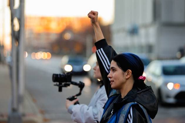 Pussy Riot films a music video to protest Indiana’s near total abortion ban in Indianapolis, USA - 14 Nov 2023 Nadya Tolokonnikova, a founder of Pussy Riot, raises a fist as she directs the filming of the music video for a song titled, God Save Abortion, to protest Indiana’s near total abortion ban, on the steps of the Indiana Statehouse in Indianapolis. Nadya Tolokonnikova, a founder of Pussy Riot, who is wanted by the Russian government, directed the filming. Indianapolis United States Copyright: xJeremyxHoganx xSOPAxImagesx 111423_JRH_PussyRiotIN_0700