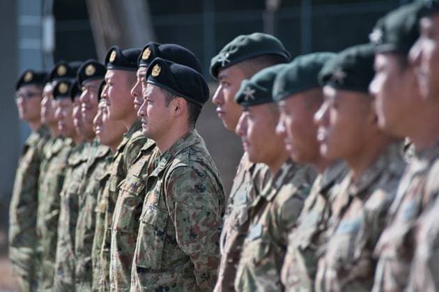 Members of the Japan Ground Self-Defense Force and British Army attend the opening ceremony for Japan Ground Self-Defense Force and British Army joint military exercise Vigilant Isles 23 at Somagahara Maneuver Area in Gunma-Prefecture, Japan on Wednesday, November 15, 2023.  TKP2023111509 KEIZOxMORI