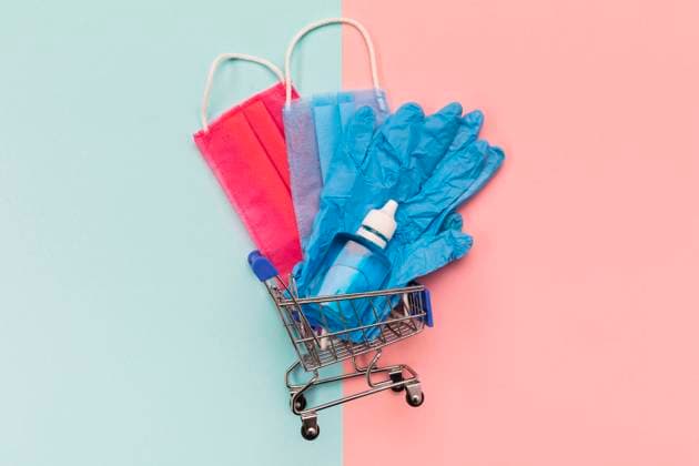 Draufsicht kleiner Einkaufswagen mit medizinischen Masken Copyright: imageBROKER/OleksandrxLatkun iblole09802165.jpg