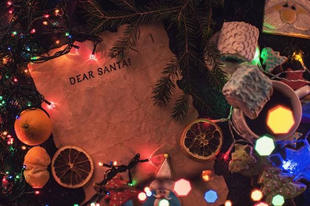 Letter to Santa Letter for Santa on decorated chrismas background with gingerbread coocies and garland Copyright: xZoonar.com RuslanxOlinchukx 11502429