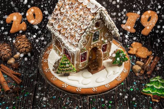 Gingerbread house with lights Homemade gingerbread house on dark background, xmas theme Copyright: xZoonar.com RuslanxOlinchukx 12999679