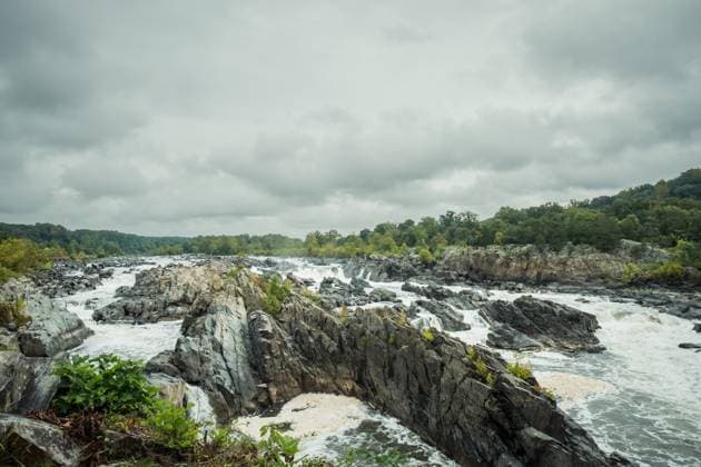 Creative Highlights World Potomac River waterfall near Washington, D.C., on a cloudy day. United States, District of Columbia, Washington R_YWPB231119CE-1288797-01