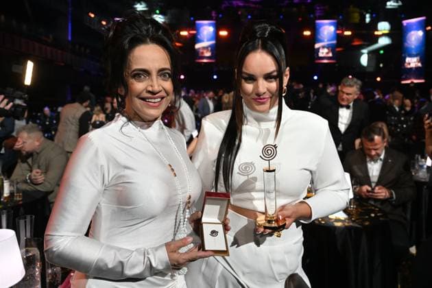 Polish-Czech singer Ewa Farna, right, won the female singer category of the Czech Nightingale music poll in Prague, Czech Republic, November 24, 2023. Czech singer Lucie Bila, left, took second place. (CTKxPhoto MichaelaxRihova) CTKPhotoP2023112407734  CTKPhotoP2023112407734