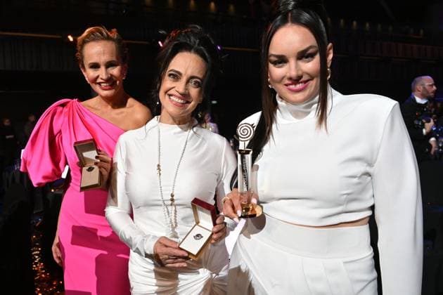 Polish-Czech singer Ewa Farna, right, won the female singer category of the Czech Nightingale music poll in Prague, Czech Republic, November 24, 2023. Czech singer Lucie Bila, center, took second place and Monika Absolonova, left, took third place. (CTKxPhoto MichaelaxRihova) CTKPhotoP2023112407953  CTKPhotoP2023112407953