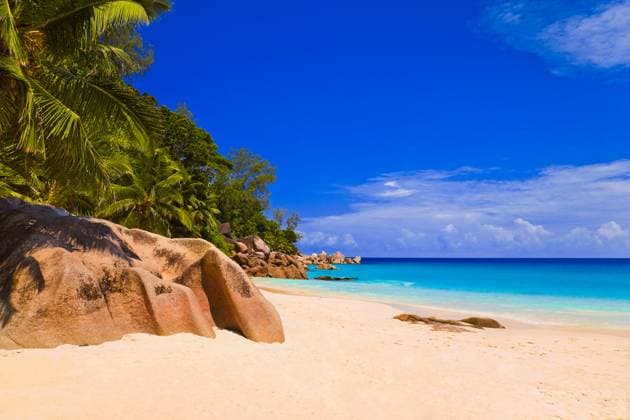 Tropical beach at island Praslin, Seychelles Tropical beach at island Praslin, Seychelles - vacation background Copyright: xZoonar.com NikolaixSorokinx 1473898