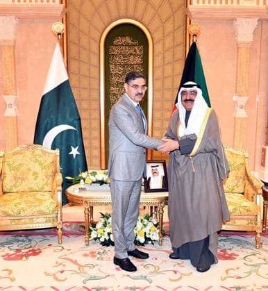 RECORD DATE NOT STATED BAYAN, KUWAIT, NOV 29: Caretaker Prime Minister, Anwaar-ul-Haq Kakar exchanging views with Sheikh Meshal Al-Ahmad Al-Jaber Al-Sabah, Crown Prince of Kuwait during meeting held at Bayan Palace on Wednesday, November 29, 2023. (PPI Images). EDITORIAL USE ONLY Copyright: xx SA-ZM-291123x ppiphotos407313